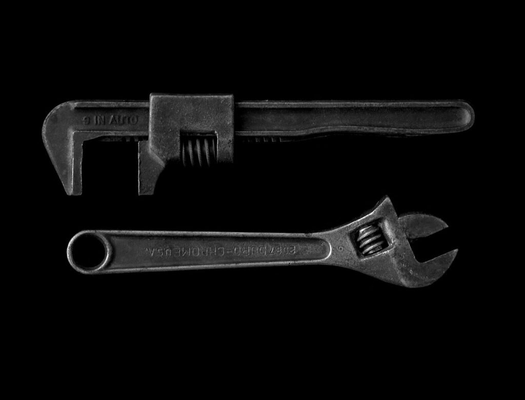 gray adjustable wrench and gray Adjustable Wrench