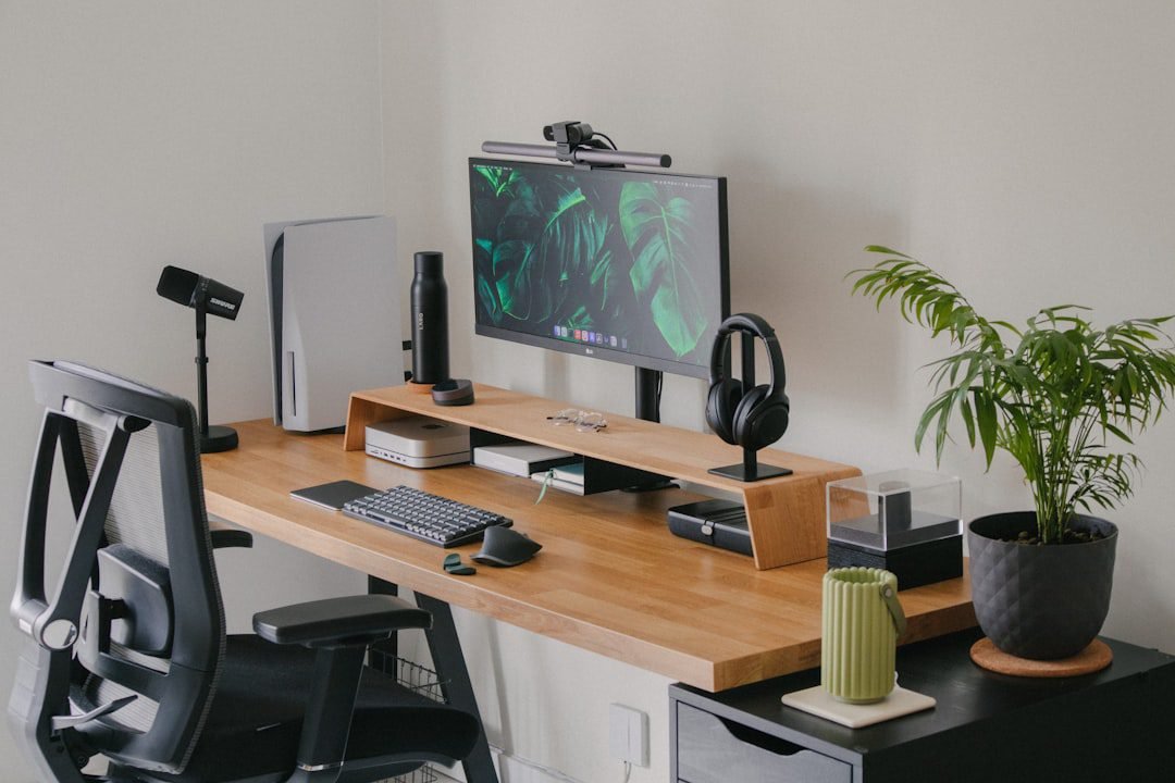 Home office desk with monitor and keyboard setup
