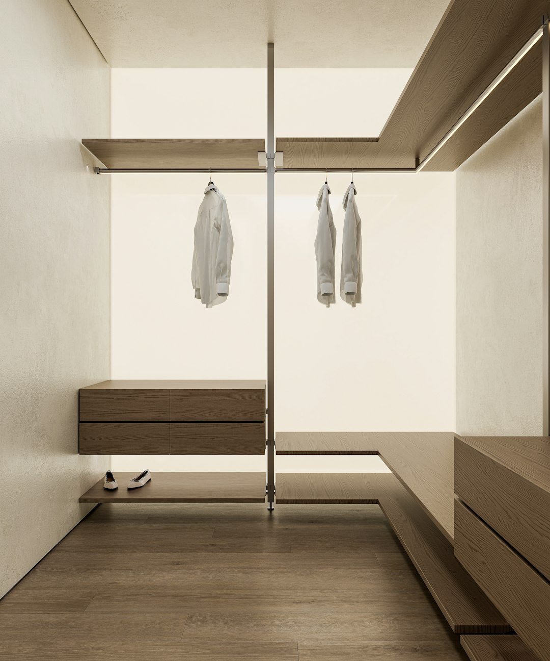 Minimalist walk-in closet with neutral-colored clothing